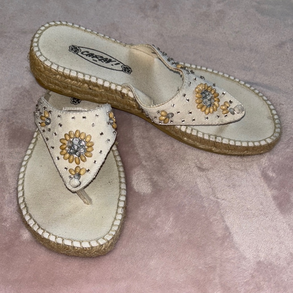 Elegant Cream and Tan Sandals with Ornate Medallion